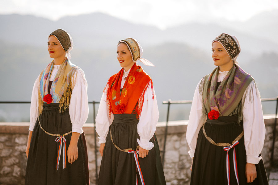 A Slovenian folk woman dancers in their national costumes.