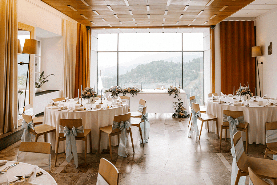 Wedding set up in pastel blue and pnk colors at lake Bled Castle restaurant.