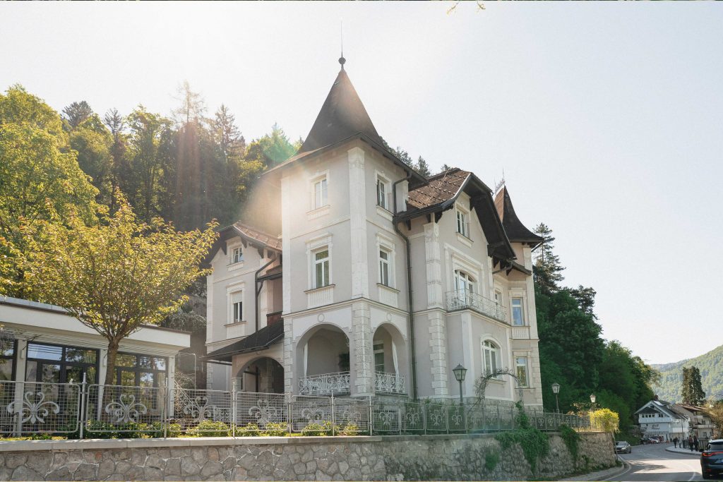 Exterior of Vila Adora, an elegant lakeside villa at Lake Bled, Slovenia, recommended by wedding planner Petra Starbek for intimate and private weddings.