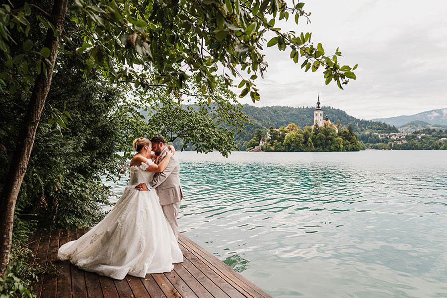 Romantic Lake Bled wedding couple by the lake at Vila Bled, Petra Starbek wedding planner