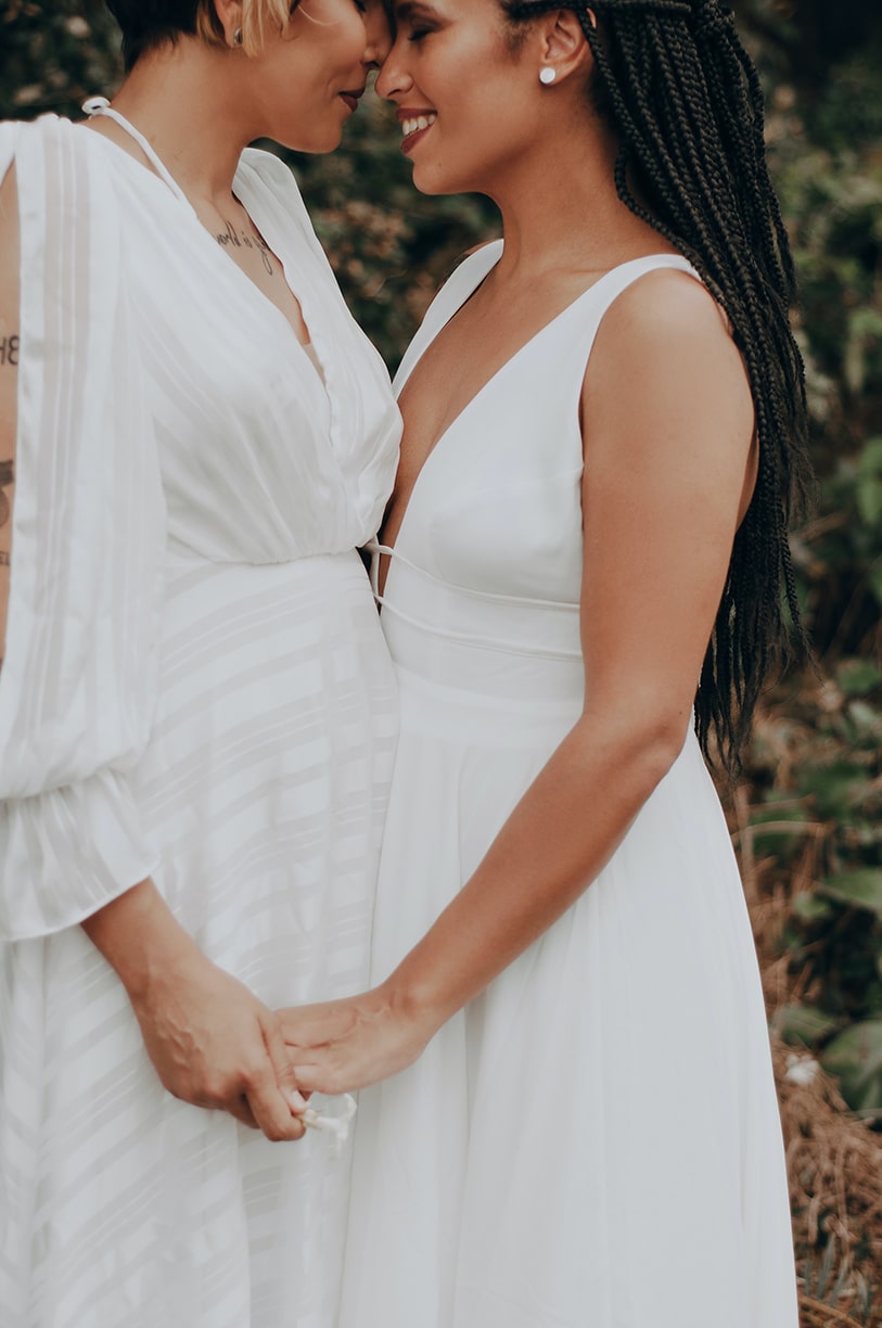 Lesbian couple in a wedding dresses at their wedding in Slovenia.