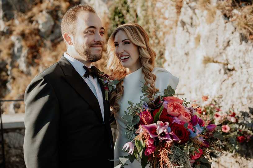 Relaxed couple enjoying their Lake Bled wedding day.
